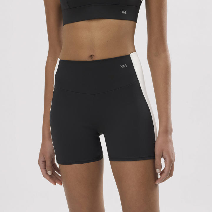 Ysabel Mora - Leggings deportivos cortos efecto push-up negros con franja en contrast